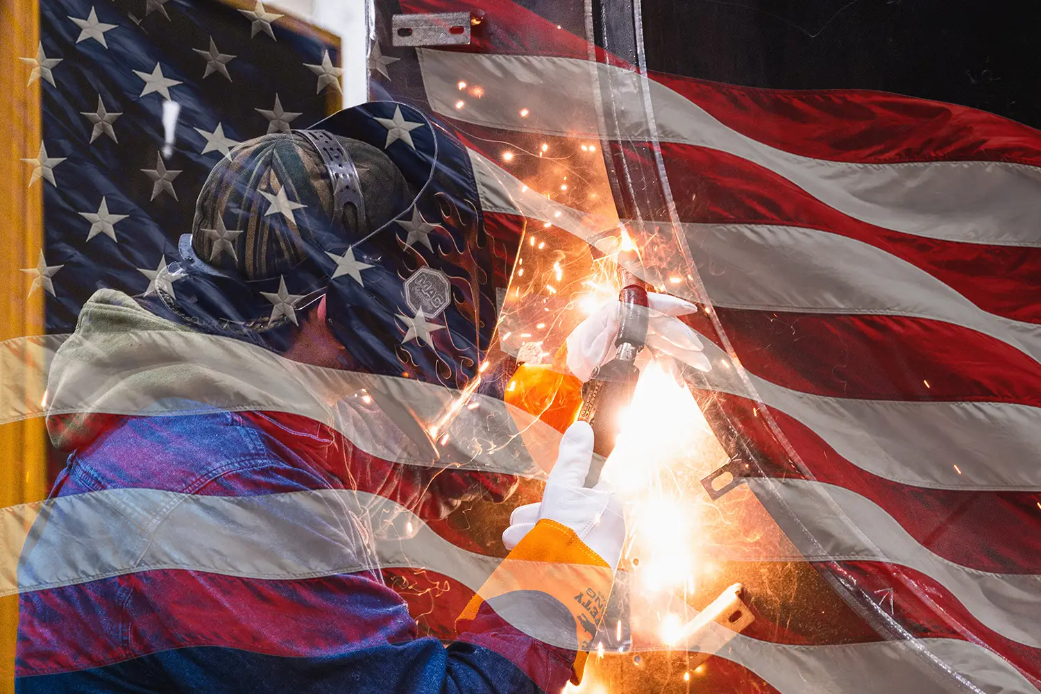 Welding sparks over a dark American flag background, representing Hi-Vac's US-made manufacturing