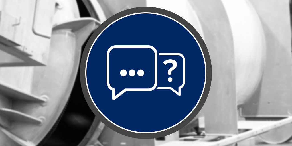 FAQ icon over a blurred industrial equipment background